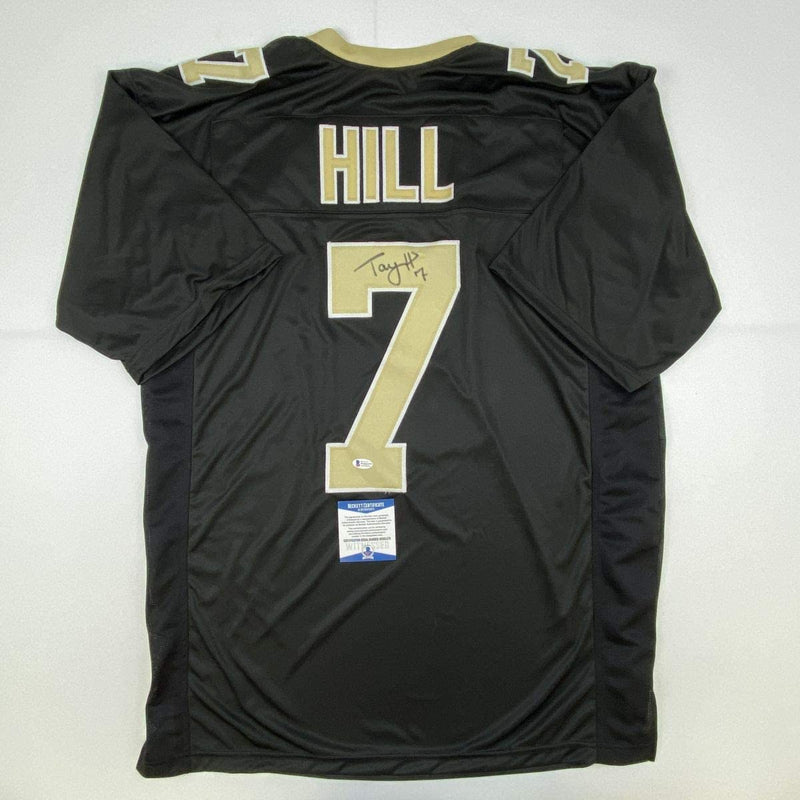 Autographed/Signed Taysom Hill New Orleans Black Football Jersey Beckett BAS COA