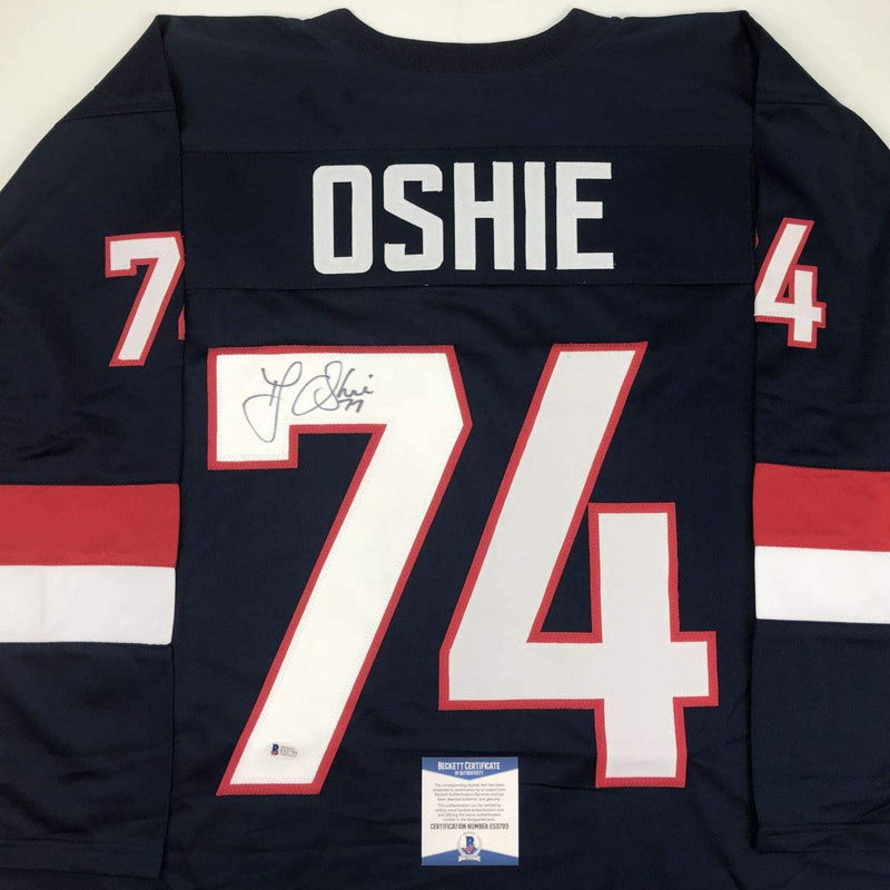 Autographed/Signed TJ T.J. Oshie United States USA Blue Olympics Hockey Jersey Beckett BAS COA