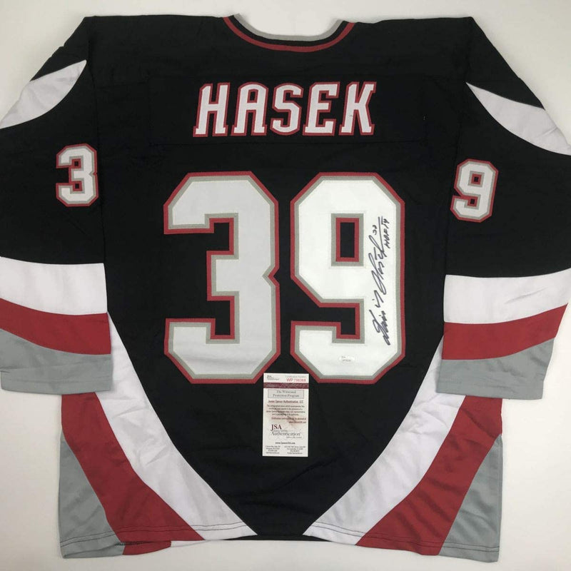 Autographed/Signed Dominik Hasek HOF 14 Buffalo Black Hockey Jersey JSA COA