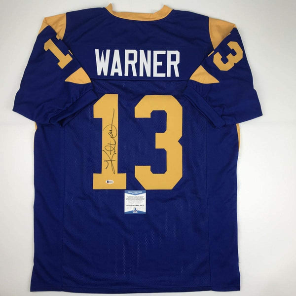 Autographed/Signed Kurt Warner St. Louis Blue Football Jersey JSA COA