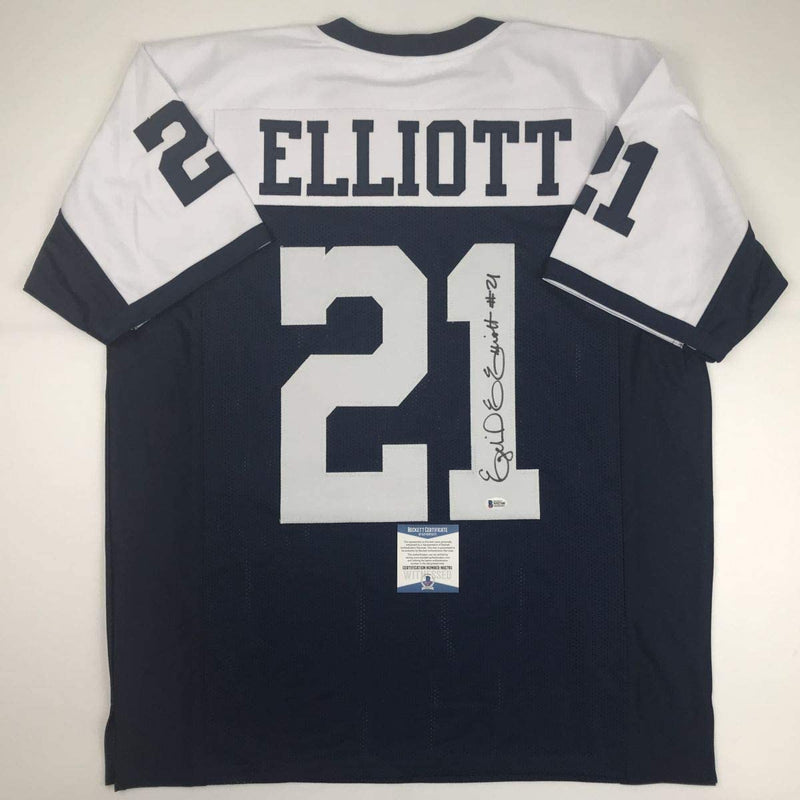 Autographed/Signed Ezekiel Elliott Dallas Thanksgiving Day Football Jersey Beckett BAS COA