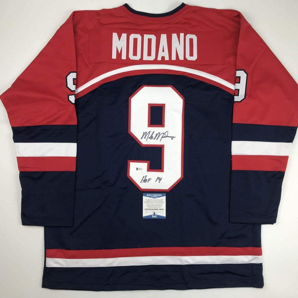 Autographed/Signed Mike Modano HOF 2014 United States USA Blue Hockey Jersey Beckett BAS COA