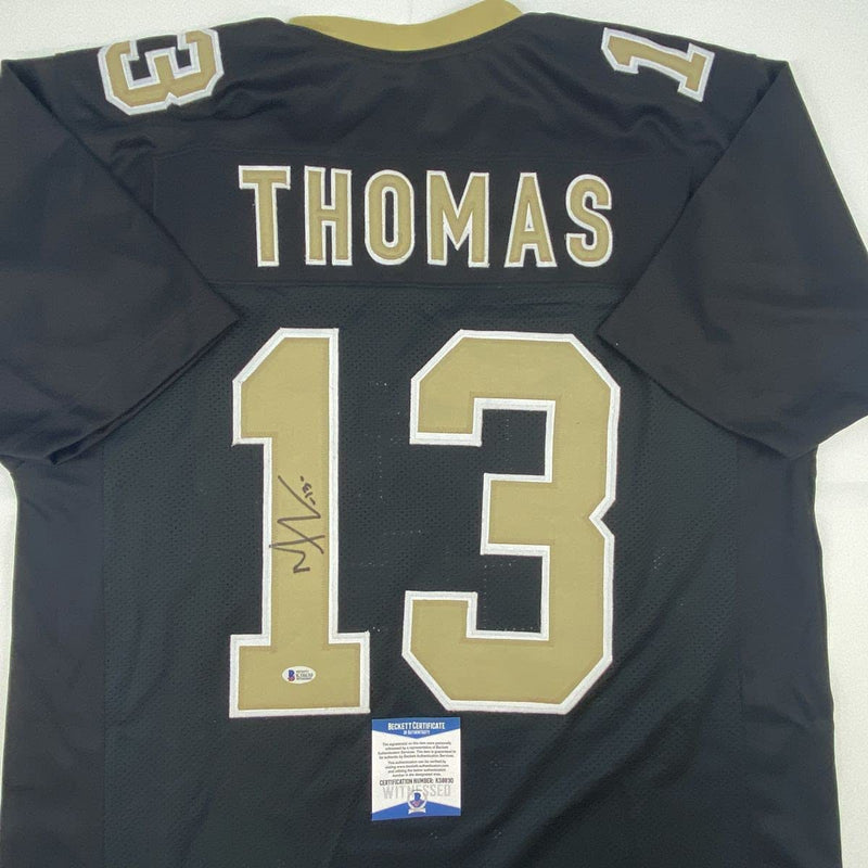 Autographed/Signed Michael Thomas New Orleans Black Football Jersey Beckett BAS COA