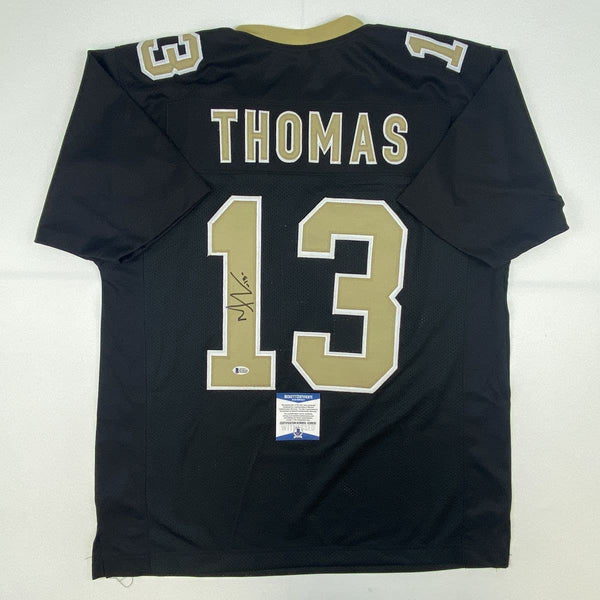 Autographed/Signed Michael Thomas New Orleans Black Football Jersey Beckett BAS COA