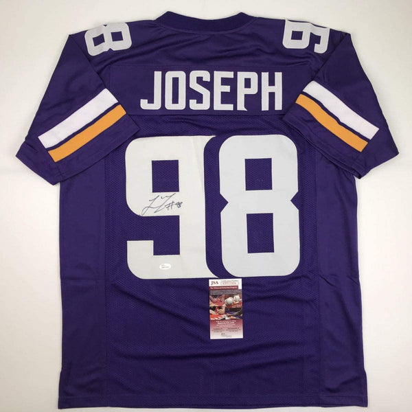 Autographed/Signed Linval Joseph Minnesota Purple Football Jersey JSA COA