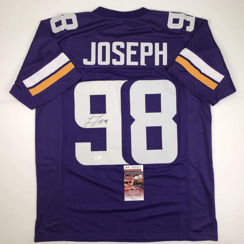 Autographed/Signed Linval Joseph Minnesota Purple Football Jersey JSA COA
