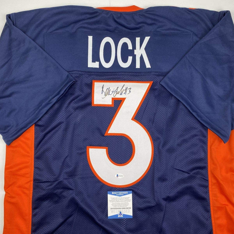 Autographed/Signed Drew Lock Denver Blue Football Jersey Beckett BAS COA