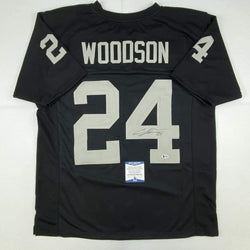 Autographed/Signed Charles Woodson Oakland Black Football Jersey Beckett BAS COA