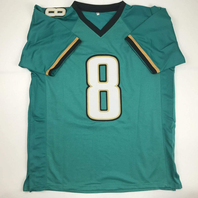 Autographed/Signed Mark Brunell Jacksonville Teal Football Jersey Beckett BAS COA
