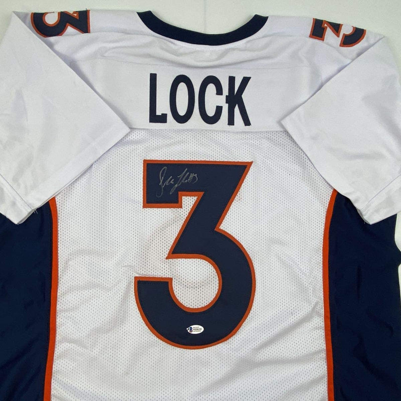 Autographed/Signed Drew Lock Denver White Football Jersey Beckett BAS COA
