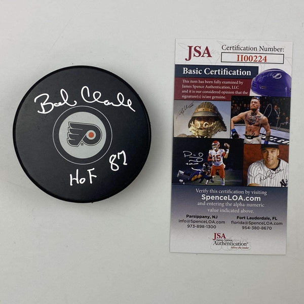 Autographed/Signed Bobby Bob Clarke HOF 87 Philadelphia Flyers Logo Hockey Puck JSA COA