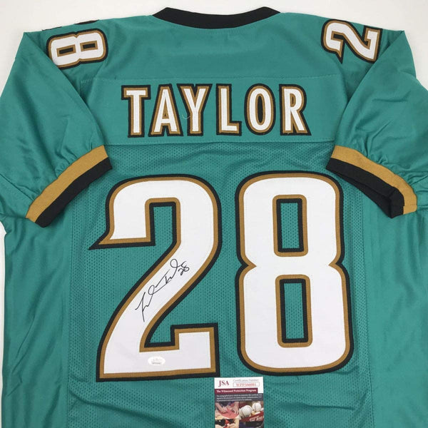 Autographed/Signed Fred Taylor Jacksonville Teal Football Jersey JSA COA