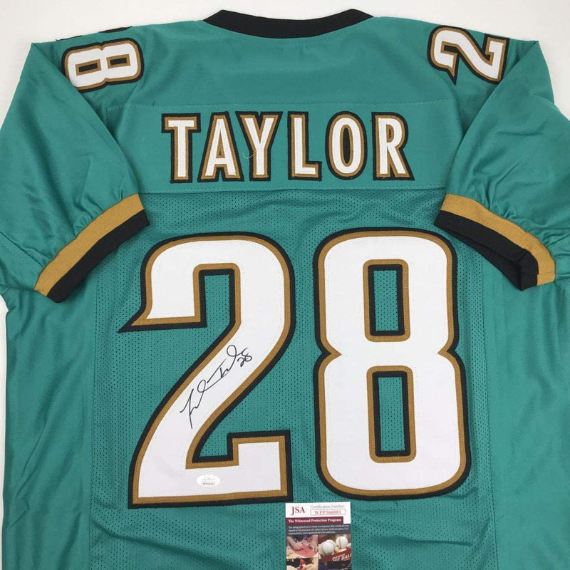 Autographed/Signed Fred Taylor Jacksonville Teal Football Jersey JSA COA