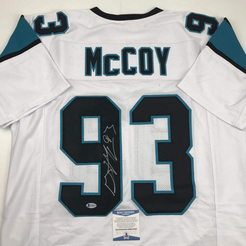 Autographed/Signed Gerald McCoy Carolina White Football Jersey Beckett BAS COA