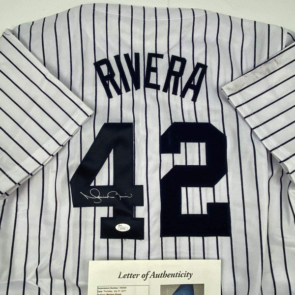 Autographed/Signed Mariano Rivera New York Pinstripe Baseball Jersey JSA COA/LOA