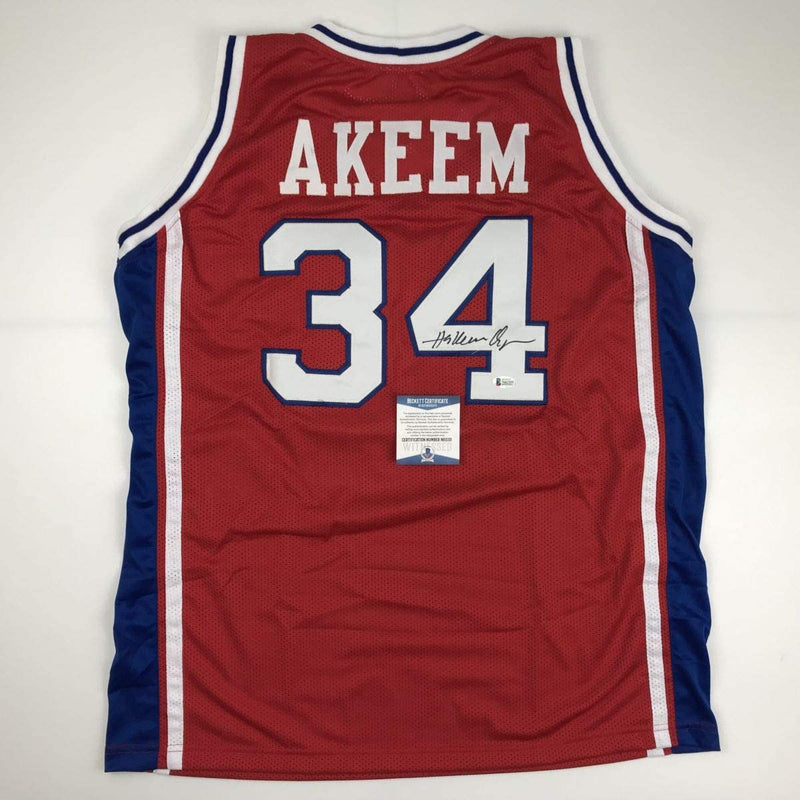 Autographed/Signed Hakeem Akeem Olajuwon Houston Red College Basketball Jersey Beckett BAS COA