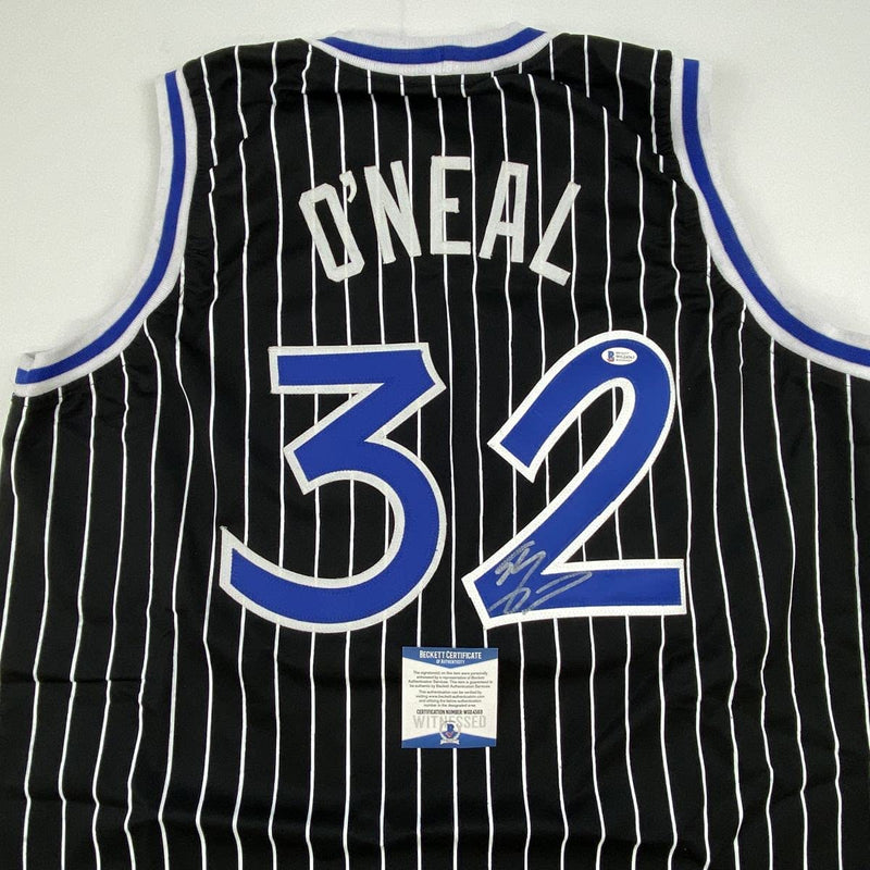 Autographed/Signed Shaquille Shaq O'Neal Orlando Black Pinstripe Basketball Jersey Beckett BAS COA
