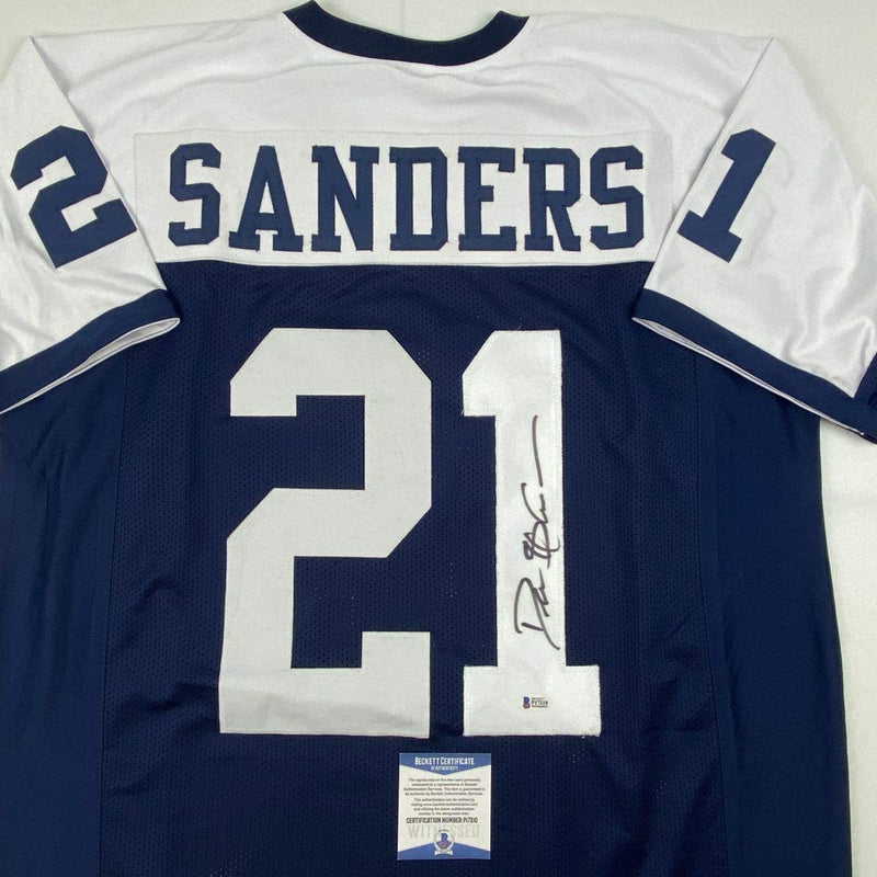 Autographed/Signed Deion Sanders Dallas Thanksgiving Day Football Jersey Beckett BAS COA