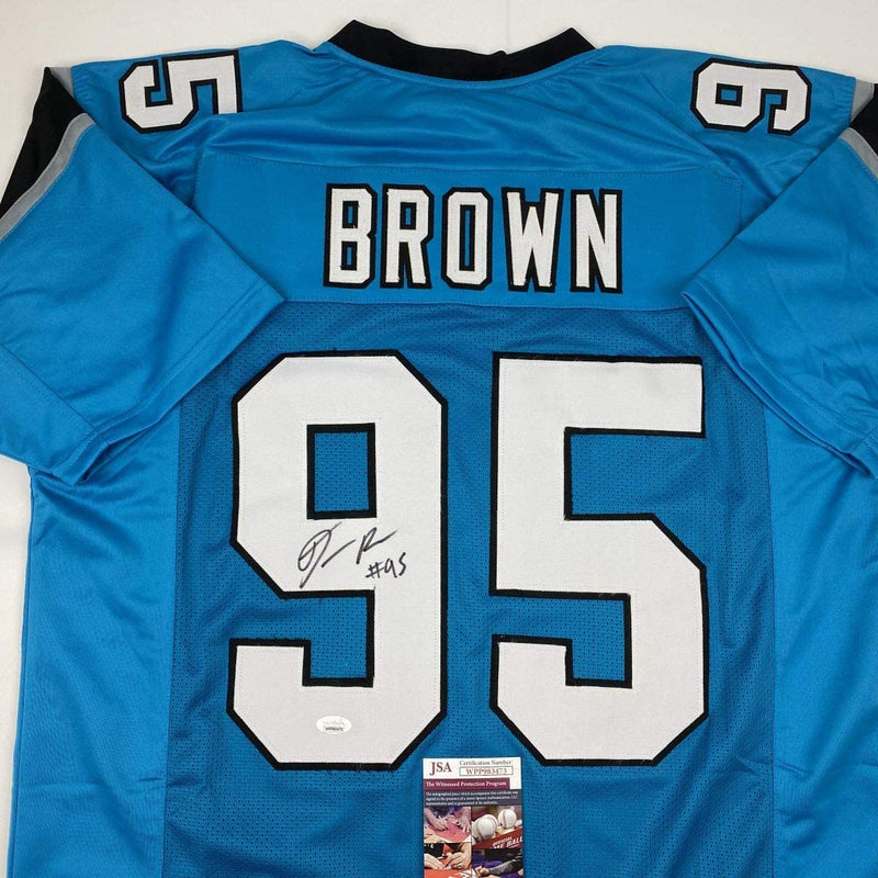Autographed/Signed Derrick Brown Carolina Blue Football Jersey JSA COA