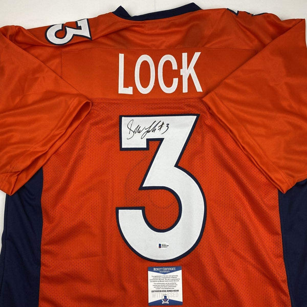 Autographed/Signed Drew Lock Denver Orange Football Jersey Beckett BAS COA