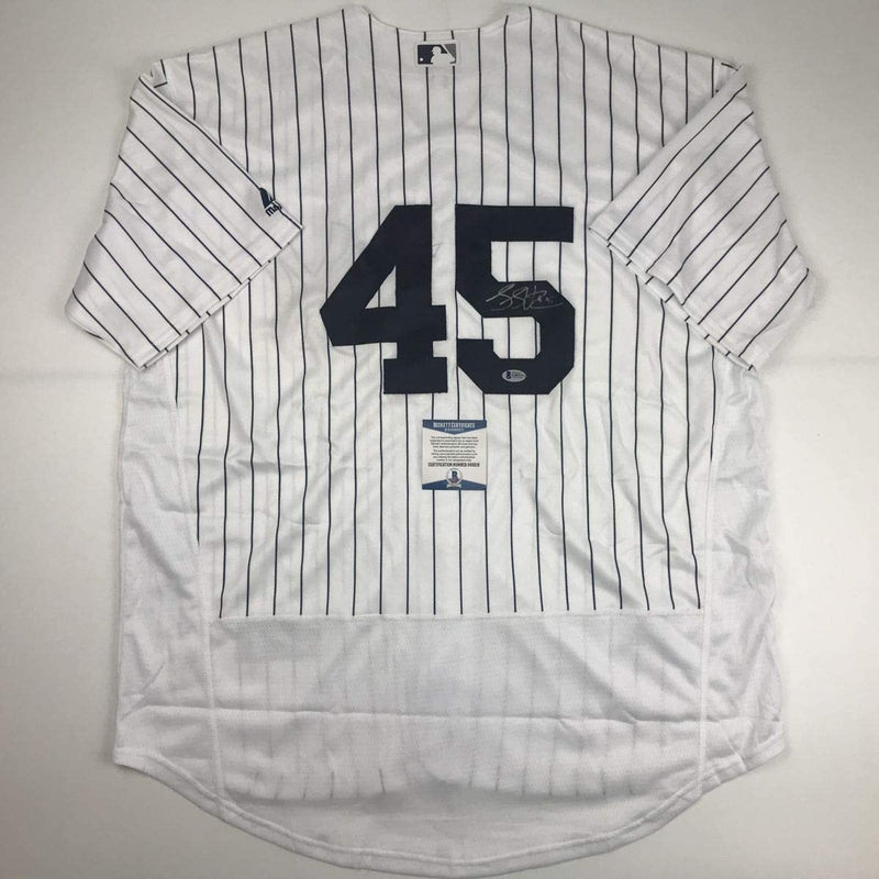 Autographed/Signed Luke Voit New York Pinstripe Baseball Jersey Beckett BAS COA