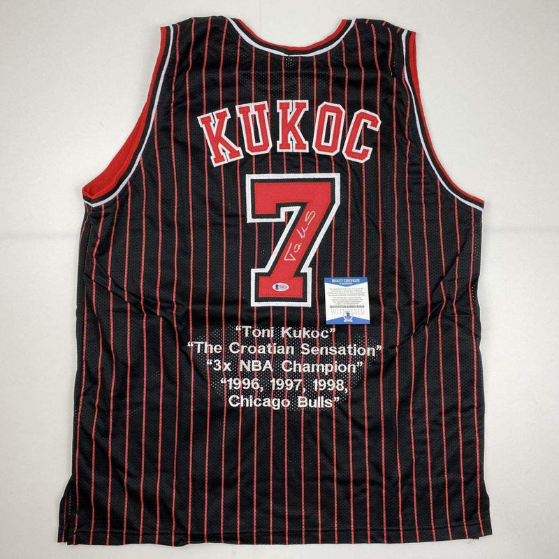 Autographed/Signed Toni Kukoc Chicago Black Pinstripe Stat Basketball Jersey Beckett BAS COA
