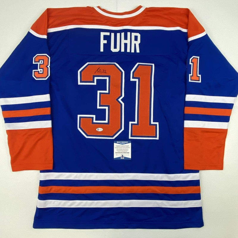 Autographed/Signed Grant Fuhr Edmonton Blue Hockey Jersey Beckett BAS COA