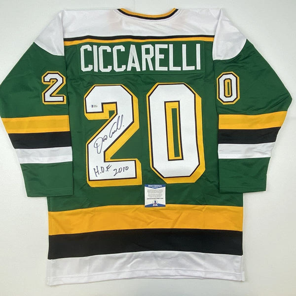 Autographed/Signed Dino Ciccarelli HOF 2010 Minnesota Green Hockey Jersey Beckett BAS COA