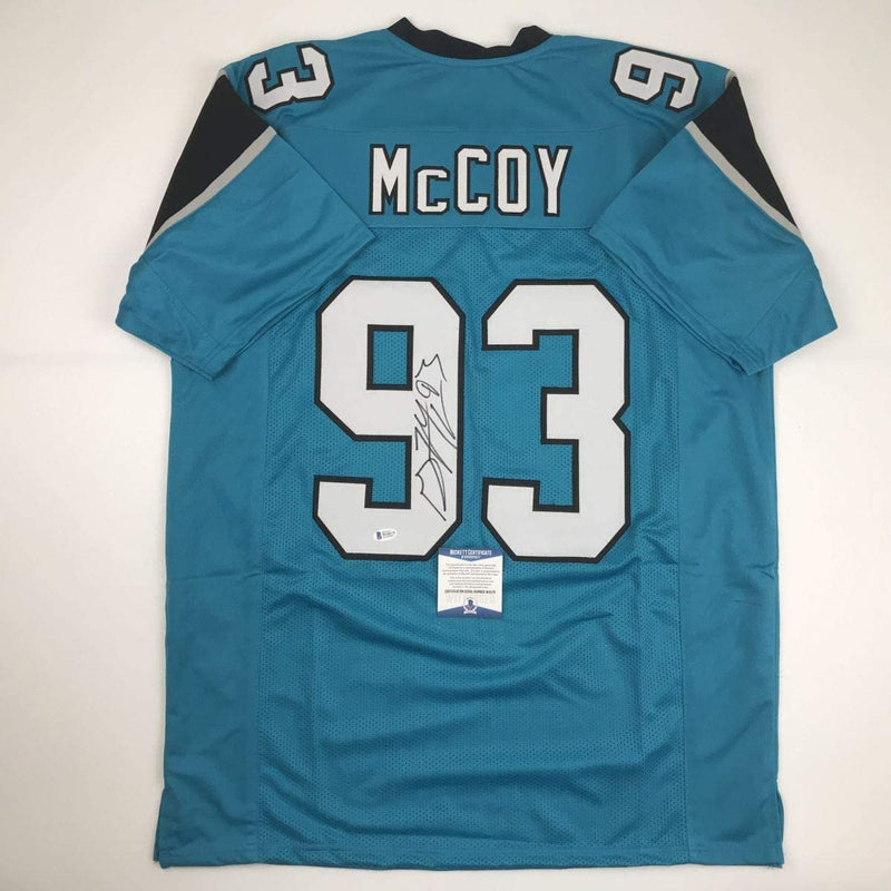 Autographed/Signed Gerald McCoy Carolina Blue Football Jersey JSA COA