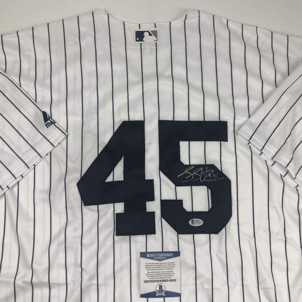 Autographed/Signed Luke Voit New York Pinstripe Baseball Jersey Beckett BAS COA