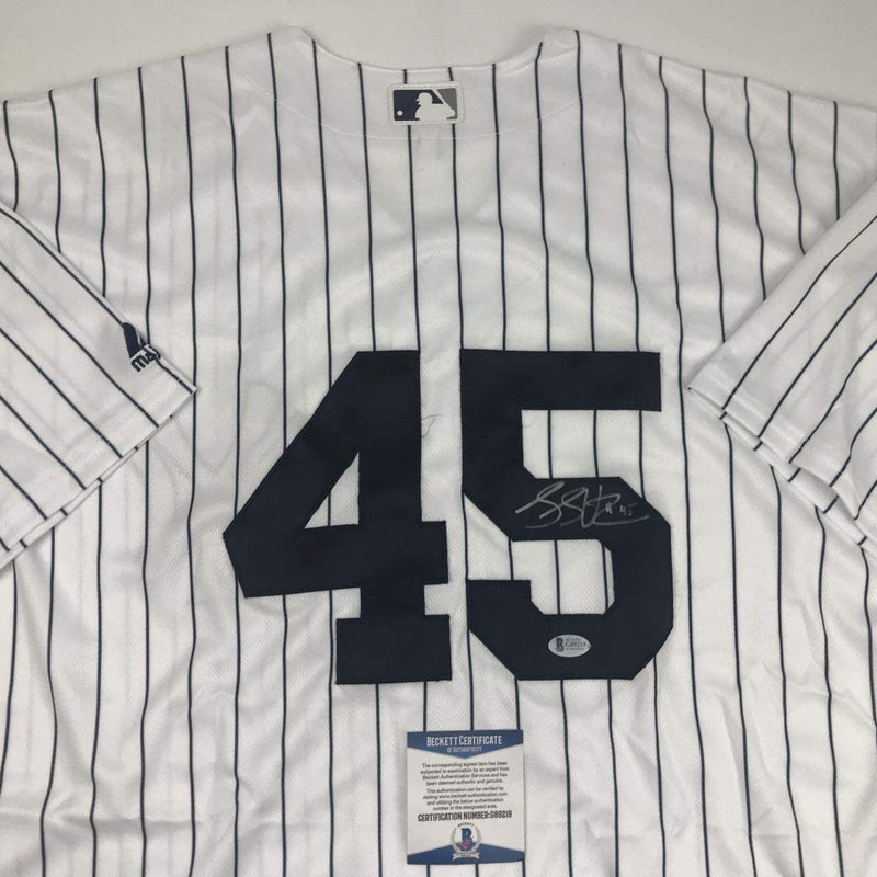 Autographed/Signed Luke Voit New York Pinstripe Baseball Jersey Beckett BAS COA