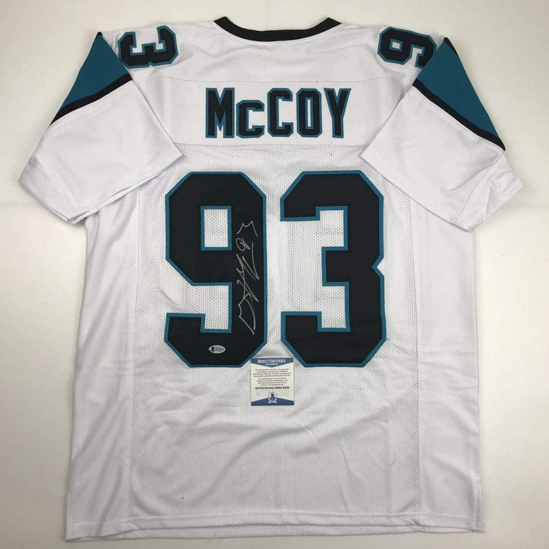 Autographed/Signed Gerald McCoy Carolina White Football Jersey Beckett BAS COA