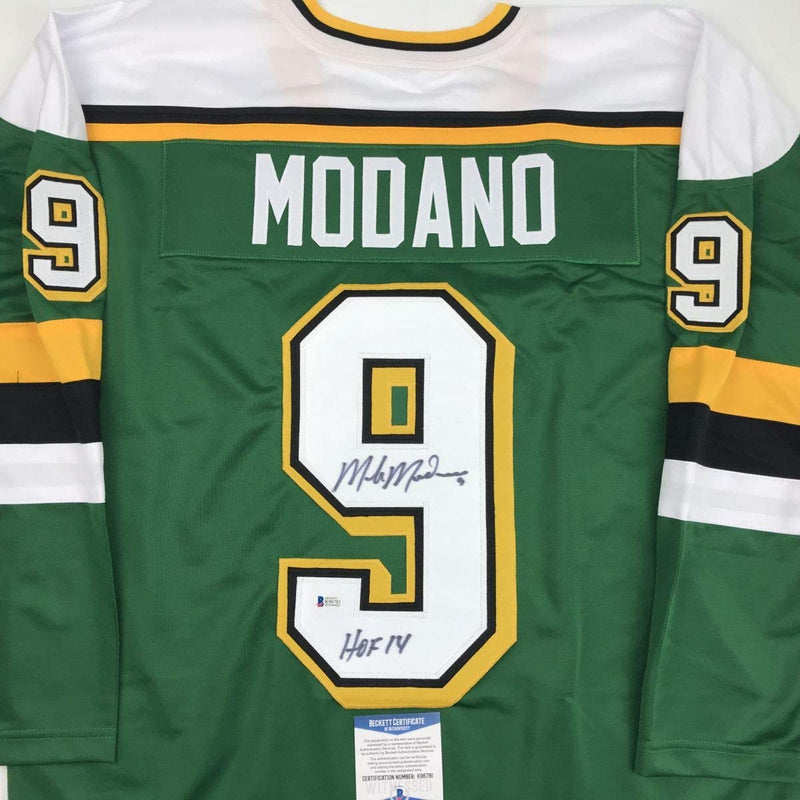 Autographed/Signed Mike Modano HOF 2014 Minnesota Green Hockey Jersey Beckett BAS COA