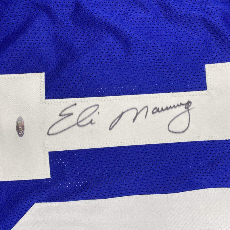 Autographed/Signed Eli Manning New York Blue Football Jersey Steiner Sports COA Hologram Only