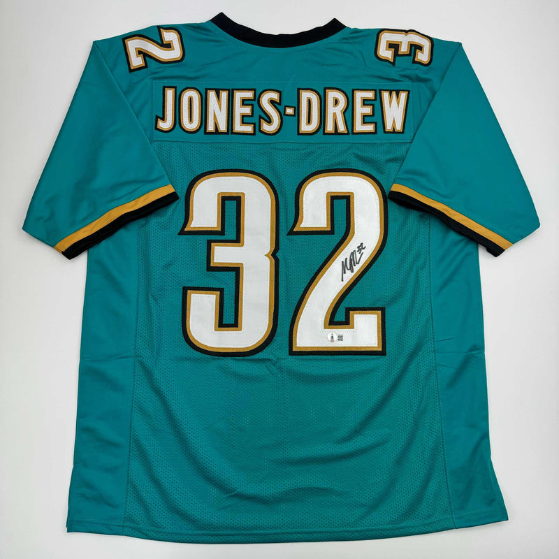 Autographed/Signed Maurice Jones-Drew Jacksonville Teal Football Jersey Beckett BAS COA