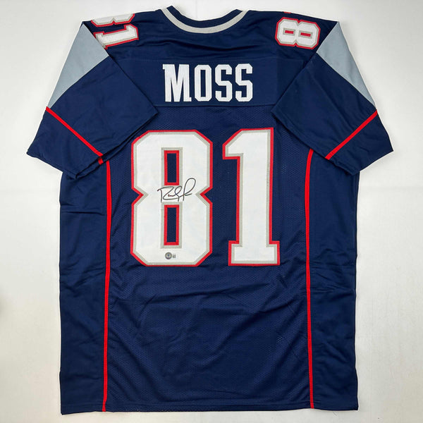 Autographed/Signed Randy Moss New England Blue Football Jersey Beckett BAS COA