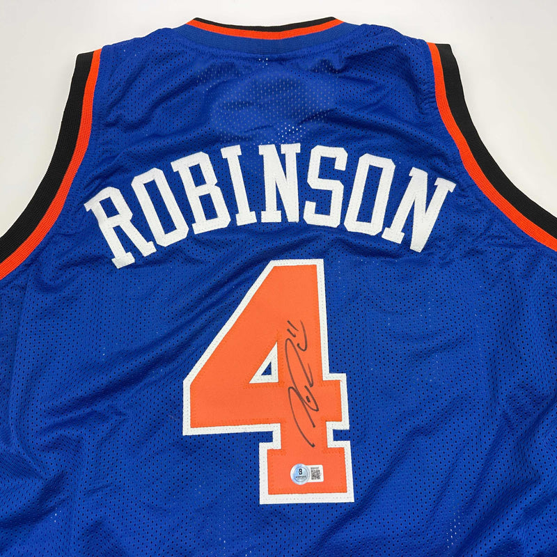 Autographed/Signed Nate Robinson New York Blue Basketball Jersey Beckett BAS COA