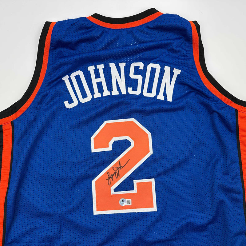 Autographed/Signed Larry Johnson New York Blue Basketball Jersey Beckett BAS COA