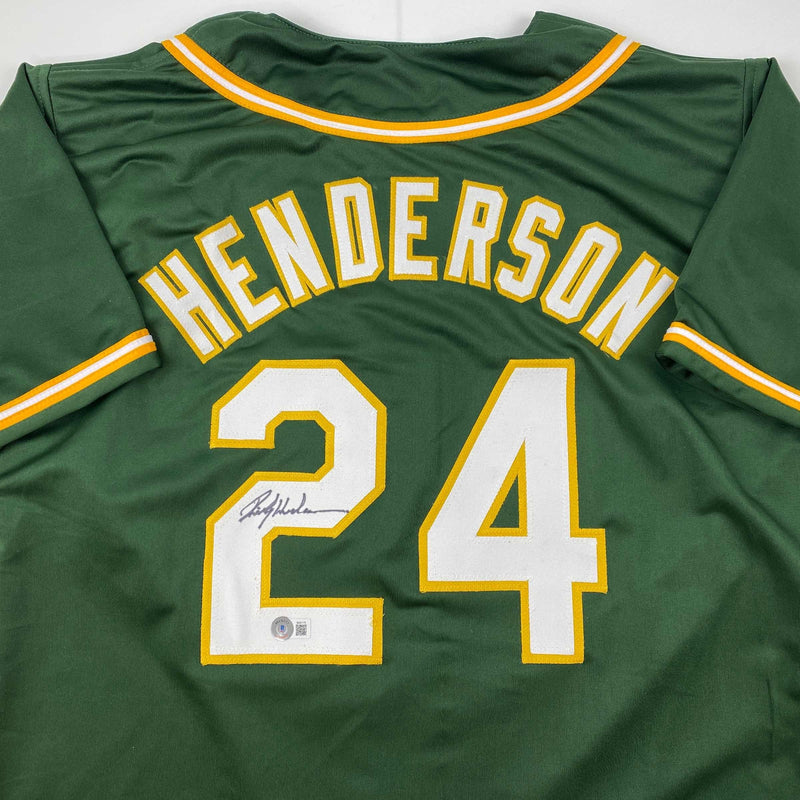 Autographed/Signed Rickey Henderson Oakland Green Baseball Jersey Beckett BAS COA