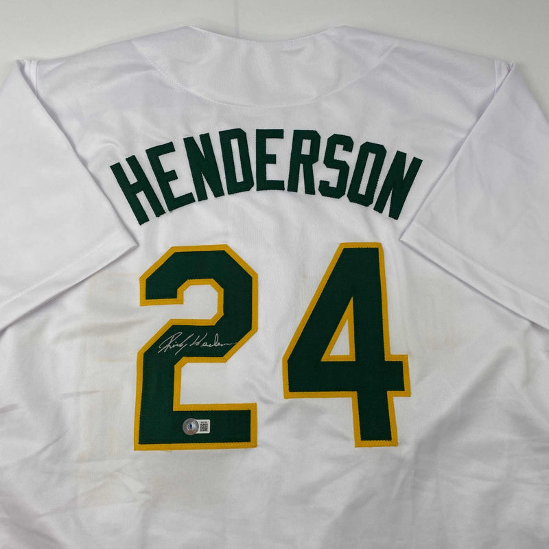 Autographed/Signed Rickey Henderson Oakland White Baseball Jersey Beckett BAS COA