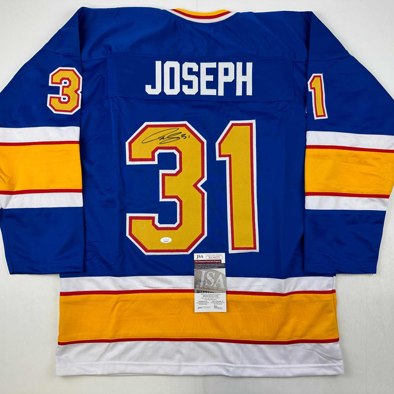 Autographed/Signed Curtis Joseph St. Louis Blue Hockey Jersey JSA COA