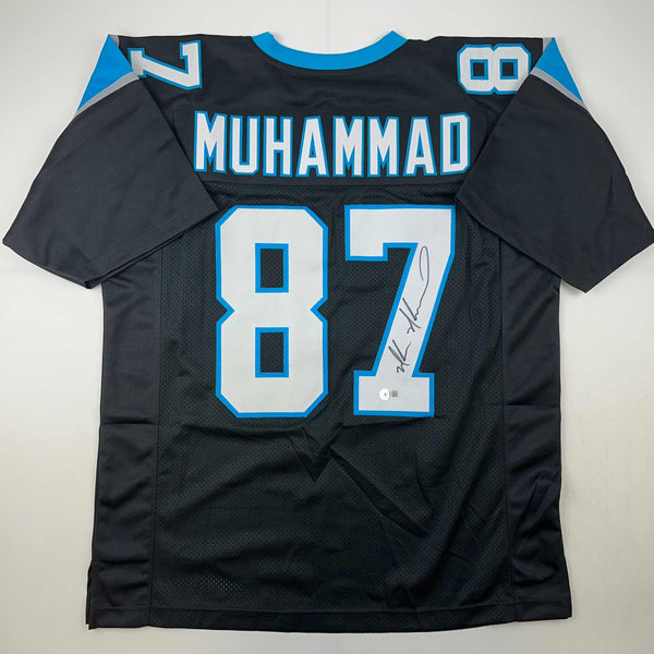 Autographed/Signed Muhsin Muhammad Carolina Black Football Jersey Beckett BAS COA
