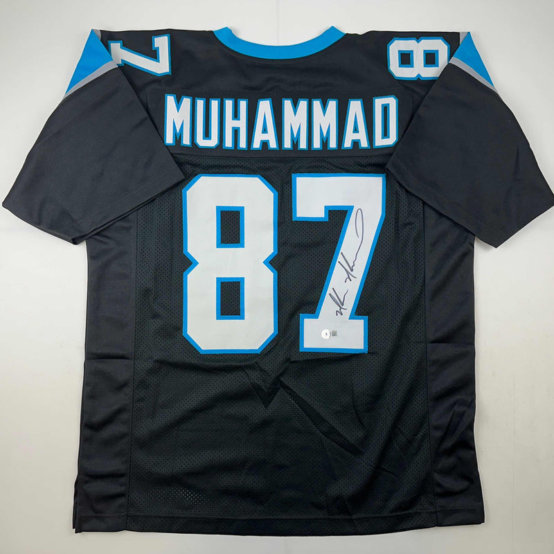 Autographed/Signed Muhsin Muhammad Carolina Black Football Jersey Beckett BAS COA