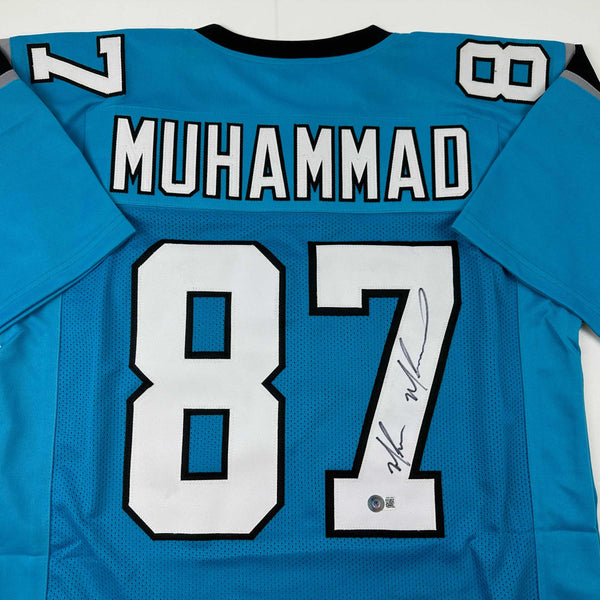 Autographed/Signed Muhsin Muhammad Carolina Blue Football Jersey Beckett BAS COA