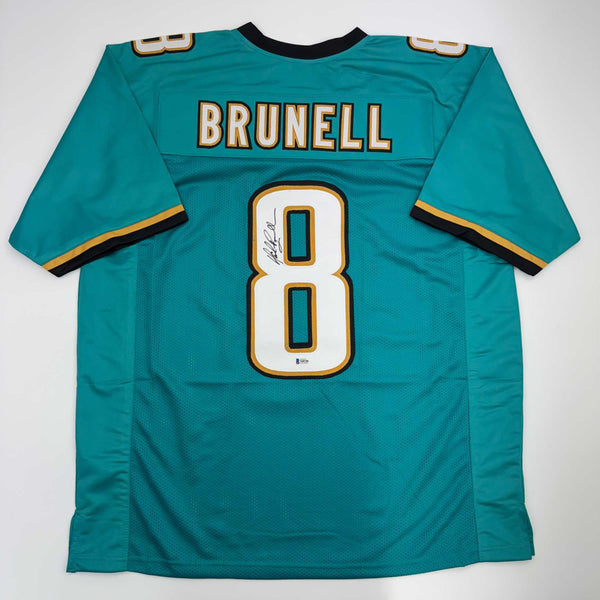 Autographed/Signed Mark Brunell Jacksonville Teal Football Jersey Beckett BAS COA