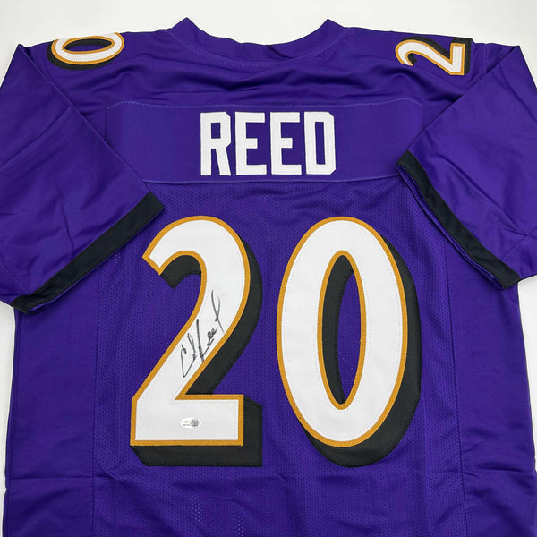 Autographed/Signed Ed Reed Baltimore Purple Football Jersey Beckett BAS COA