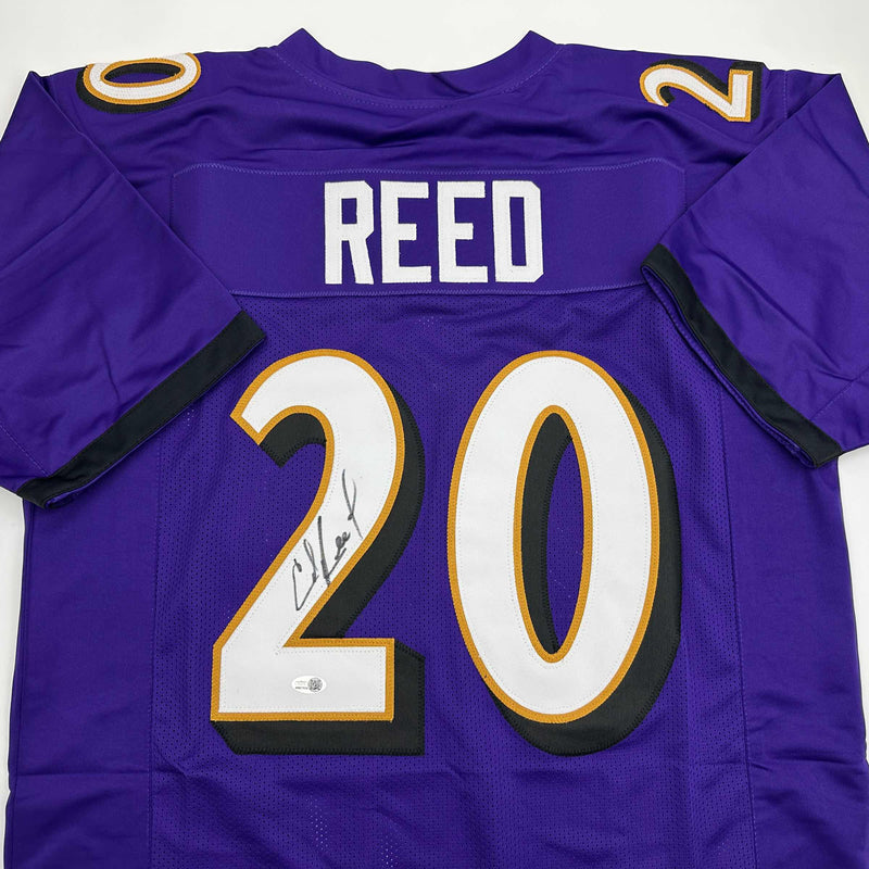 Autographed/Signed Ed Reed Baltimore Purple Football Jersey Beckett BAS COA