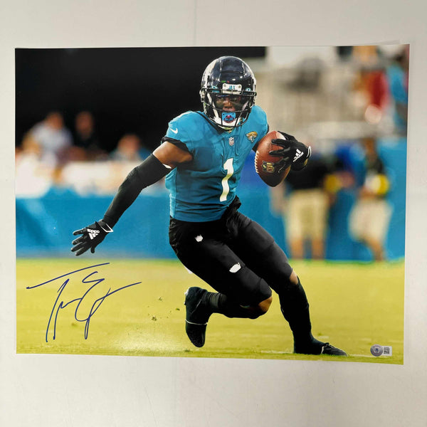 Autographed/Signed Travis Etienne Jr Jacksonville Jaguars 16x20 Football Photo Beckett BAS COA
