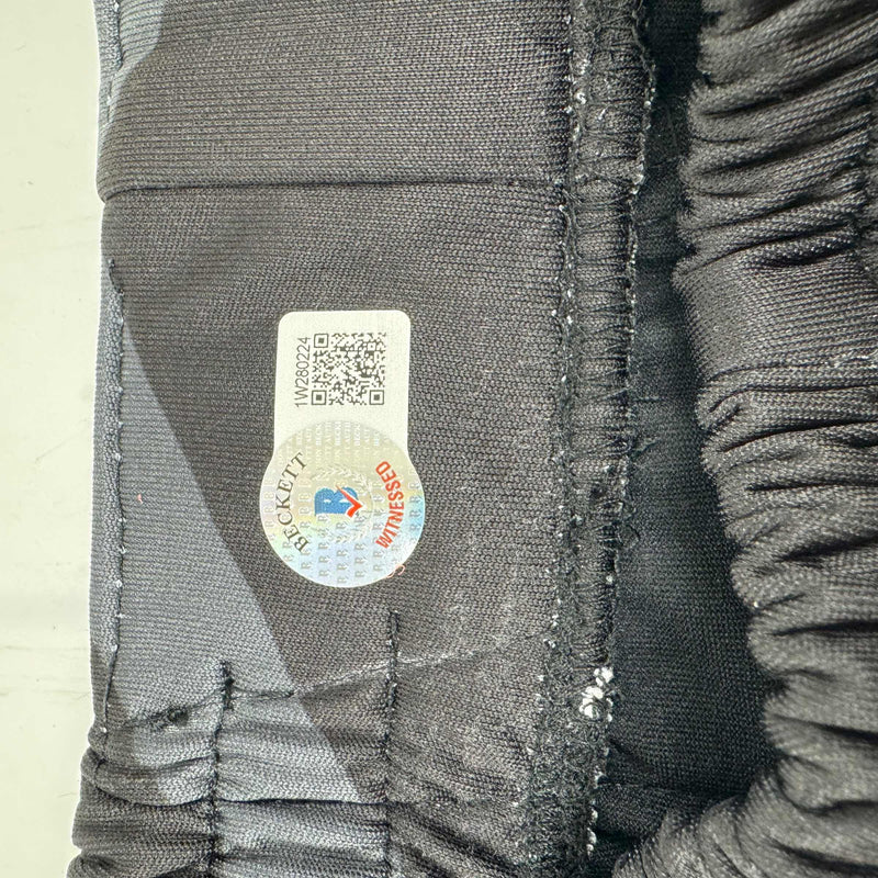 Autographed/Signed Stipe Miocic Black and Gold UFC MMA Trunks Shorts Ultimate Fighting Beckett BAS COA