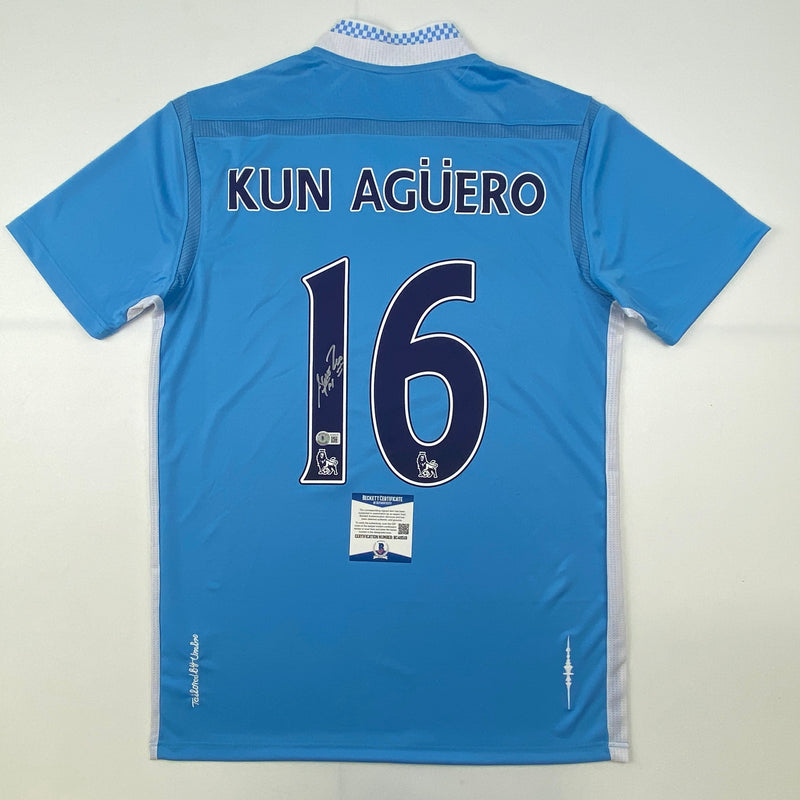 Autographed/Signed Sergio Kun Aguero Manchester City Blue Soccer Futbol Jersey Beckett BAS COA